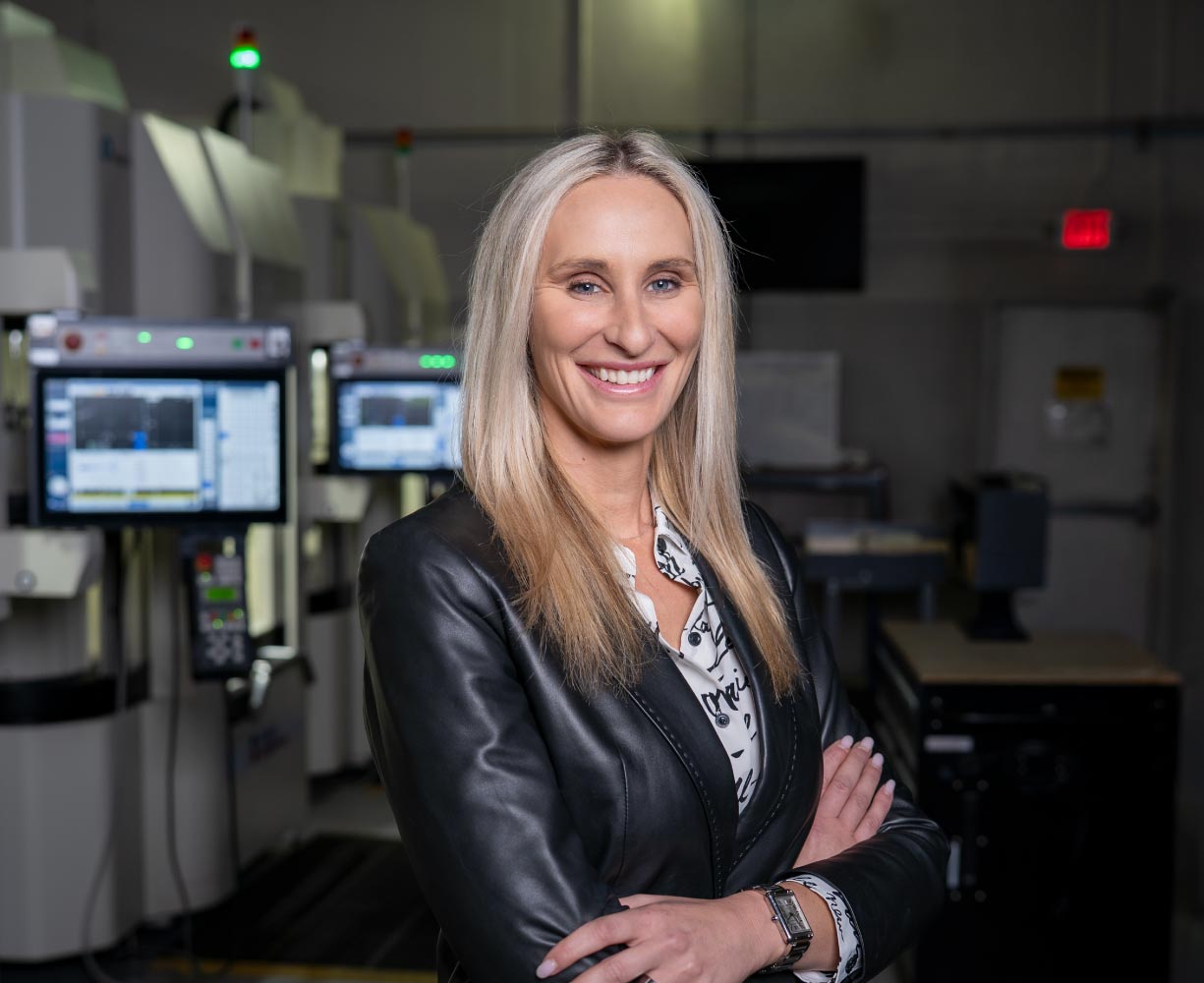 Portrait of Melanie from the Burke Aerospace team in the manufacturing facility
